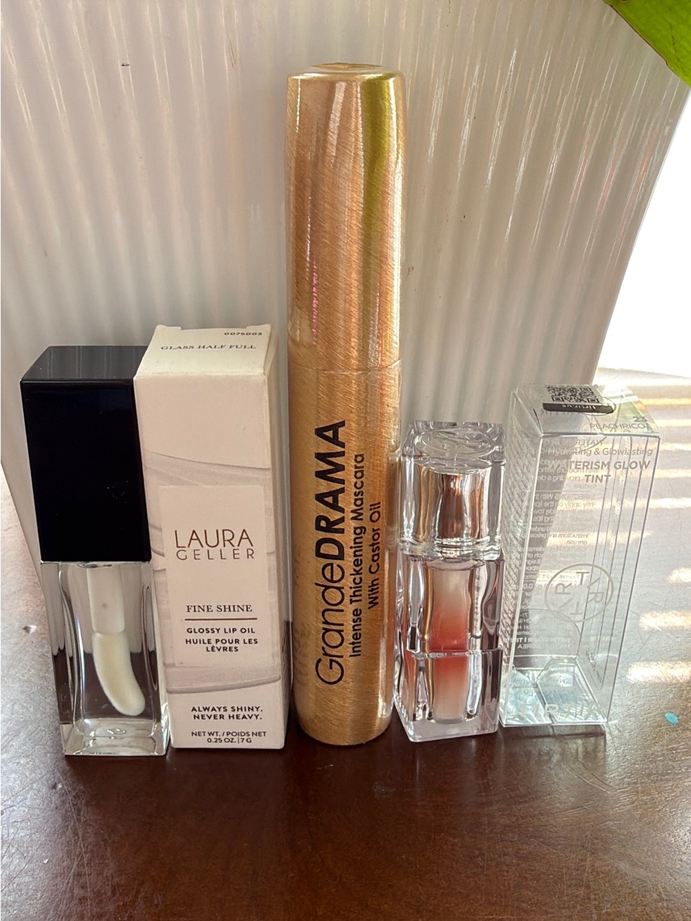 Laura Geller Glossy Lip Oil + Grande Drama Mascara + Tirtir Glow